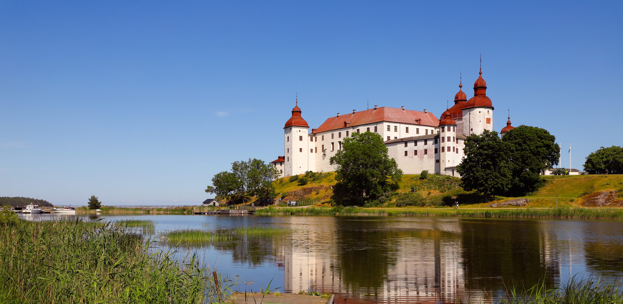 Summer at the medieval Lacko castle located in Swedish province of Vastergotland.